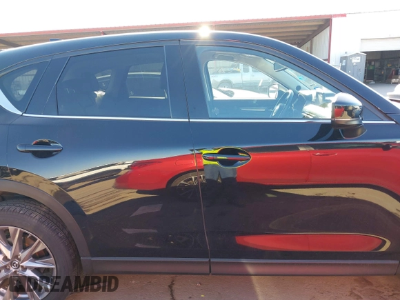 2021 Mazda CX-5 Grand Touring with VIN JM3KFADM1M0406098, listed as a IAAI auction lot 41654735 with 33,050 mi miles. Bid and sale history available at carsss.com. Image 13.