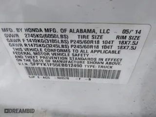 2014 Honda Ridgeline RTL with VIN 5FPYK1F55EB012490, listed as a IAAI auction lot 41391884 with 130,121 mi miles. Bid and sale history available at carsss.com. Image 9.