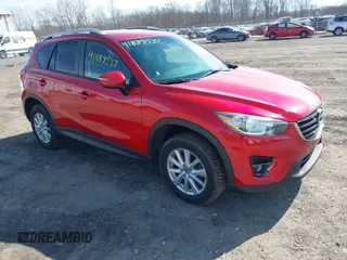 2016 Mazda CX-5 Touring with VIN JM3KE4CY5G0816285, listed as a IAAI auction lot 41888537 with 101,598 mi miles. Bid and sale history available at carsss.com. Image 1.