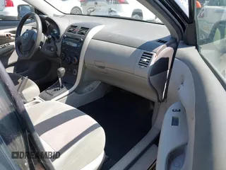 2009 Toyota Corolla with VIN 1NXBU40E89Z056754, listed as a IAAI auction lot 41989594 with 187,890 mi miles. Bid and sale history available at carsss.com. Image 5.