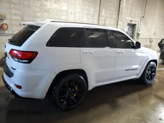 2020 Jeep Grand Cherokee Trackhawk with VIN 1C4RJFN97LC141522, listed as a Copart auction lot 80134014 with 53,494 mi miles and Salvage title. Bid and sale history available at DreamBid. Image 3.