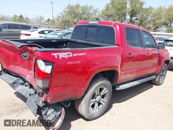 2018 Toyota Tacoma SR5 with VIN 5TFAZ5CN0JX063350, listed as a IAAI auction lot 41829396 with 61,155 mi miles and . Bid and sale history available at DreamBid. Image 4.