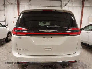 2021 Chrysler Pacifica Touring L with VIN 2C4RC1BG7MR531772, listed as a IAAI auction lot 41834392 with 156,123 mi miles and . Bid and sale history available at DreamBid. Image 16.
