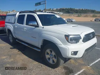 2014 Toyota Tacoma PreRunner with VIN 3TMJU4GN7EM158440, listed as a IAAI auction lot 41353276 with 1 mi miles. Bid and sale history available at carsss.com. Image 1.
