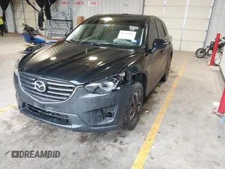 2016 Mazda CX-5 Grand Touring with VIN JM3KE2DY9G0705127, listed as a IAAI auction lot 41412910 with 181,993 mi miles. Bid and sale history available at carsss.com. Image 18.
