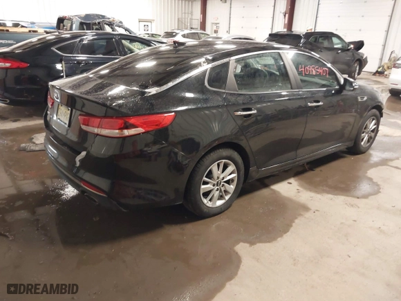 2017 Kia Optima LX with VIN 5XXGT4L31HG165150, listed as a IAAI auction lot 40985407 with 154,945 mi miles. Bid and sale history available at carsss.com. Image 4.