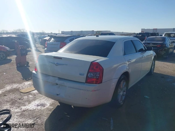 2008 Chrysler 300 Touring with VIN 2C3LA53G08H283303, listed as a IAAI auction lot 41680375 with 210,765 mi miles. Bid and sale history available at carsss.com. Image 4.
