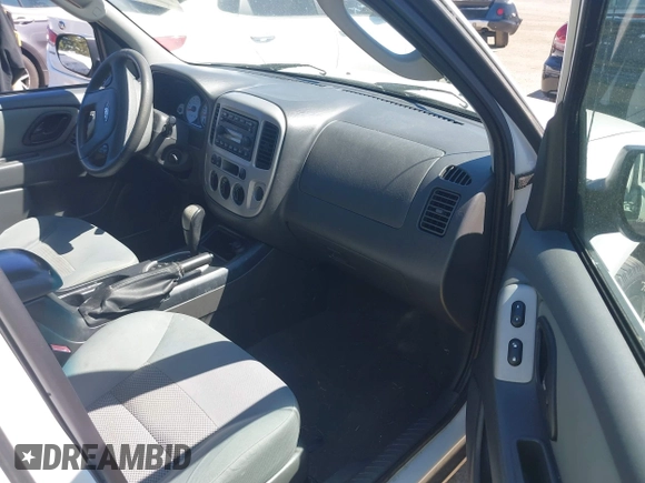 2007 Ford Escape XLT with VIN 1FMYU03127KC05177, listed as a IAAI auction lot 42199281 with 144,846 mi miles and . Bid and sale history available at DreamBid. Image 5.