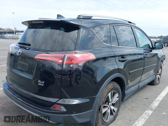 2018 Toyota RAV4 XLE with VIN 2T3RFREV0JW786393, listed as a IAAI auction lot 41997778 with 44,666 mi miles. Bid and sale history available at carsss.com. Image 4.