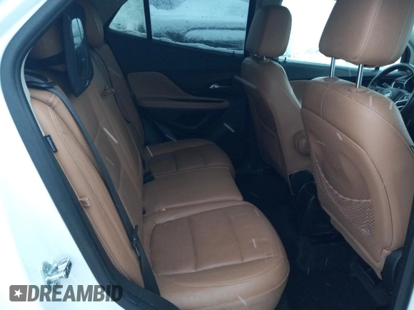 2019 Buick Encore Essence with VIN KL4CJGSM5KB738932, listed as a Copart auction lot 83087444 with 59,162 mi miles and Salvage Title. Bid and sale history available at DreamBid. Image 10.