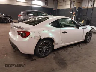 2017 Toyota 86 with VIN JF1ZNAA16H8710674, listed as a IAAI auction lot 41698660 with 120,000 mi miles. Bid and sale history available at carsss.com. Image 4.