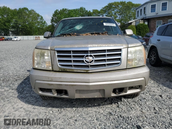 2006 Cadillac Escalade z VIN 1GYEK63N76R136618, wystawiony jako Copart lot #58990945 z przebiegiem Nie podano mil oraz Czysty tytuł • Clean title. Historia ofert i sprzedaży dostępna na DreamBid. Obrazek 5.
