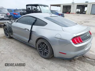 2020 Ford Mustang EcoBoost with VIN 1FA6P8TH9L5139174, listed as a IAAI auction lot 42148089 with 115,979 mi miles and . Bid and sale history available at DreamBid. Image 3.
