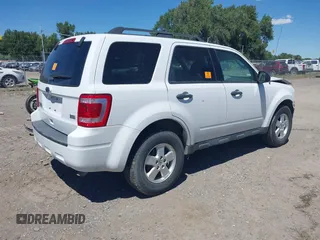 2012 Ford Escape XLT with VIN 1FMCU9DG9CKA09099, listed as a IAAI auction lot 40371699 with 136,707 mi miles and . Bid and sale history available at DreamBid. Image 4.