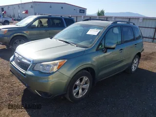 2014 Subaru Forester Premium with VIN JF2SJAEC2EH445669, listed as a IAAI auction lot 42772336 with 103,983 mi miles and . Bid and sale history available at DreamBid. Image 2.