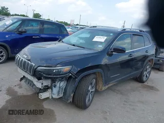 2021 Jeep Cherokee Limited with VIN 1C4PJLDX8MD183389, listed as a IAAI auction lot 42286478 with 93,677 mi miles and . Bid and sale history available at DreamBid. Image 2.