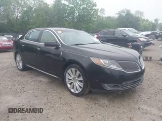 2013 Lincoln MKS EcoBoost with VIN 1LNHL9FT4DG607785, listed as a IAAI auction lot 42279833 with 126,548 mi miles and . Bid and sale history available at DreamBid. Image 1.