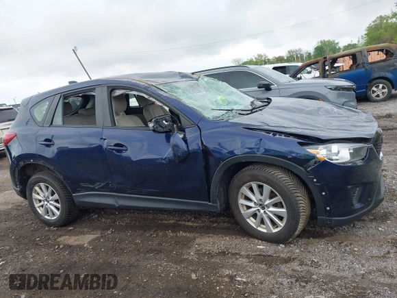 2013 Mazda CX-5 Sport with VIN JM3KE2BE1D0160254, listed as a IAAI auction lot 42256555 with 136,476 mi miles and . Bid and sale history available at DreamBid. Image 13.