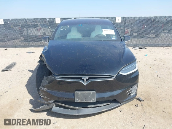 2019 Tesla Model X 75D with VIN 5YJXCBE22KF184504, listed as a IAAI auction lot 41802023 with 137,094 mi miles. Bid and sale history available at carsss.com. Image 12.