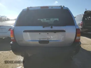 2004 Jeep Grand Cherokee Laredo with VIN 1J4GW48S54C349888, listed as a Copart auction lot 43009574 with 238,247 mi miles and Salvage title. Bid and sale history available at DreamBid. Image 6.