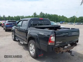2013 Toyota Tacoma with VIN 3TMLU4EN4DM117239, listed as a IAAI auction lot 42494359 with 239,635 mi miles and . Bid and sale history available at DreamBid. Image 3.