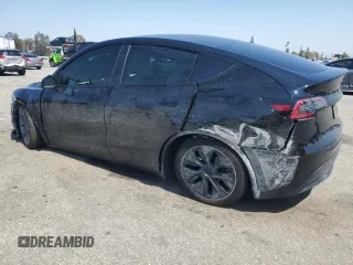 2024 Tesla Model Y z VIN 7SAYGDED8RF123516, wystawiony jako Copart lot #55354655 z przebiegiem 12 521 mil mil oraz Szkoda całkowita • Salvage title. Historia ofert i sprzedaży dostępna na DreamBid. Obrazek 2.