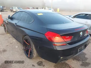 2015 BMW 6 Series 650i with VIN WBAYM9C59FD248412, listed as a IAAI auction lot 41855265 with 1,032,951 mi miles and . Bid and sale history available at DreamBid. Image 3.