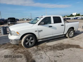 2020 Ram 1500 Tradesman with VIN 3C6RR6KT2LG194819, listed as a Copart auction lot 61950865 with 97,151 mi miles and Salvage title. Bid and sale history available at DreamBid. Image 1.
