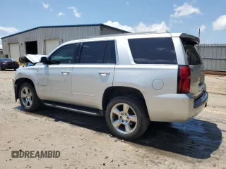 2017 Chevrolet Tahoe LS with VIN 1GNSCAKC4HR403104, listed as a Copart auction lot 57823865 with 185,407 mi miles and Salvage title. Bid and sale history available at DreamBid. Image 2.