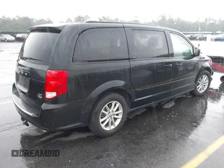 2015 Dodge Grand Caravan SXT with VIN 2C4RDGCG8FR556861, listed as a IAAI auction lot 42224948 with 110,797 mi miles and . Bid and sale history available at DreamBid. Image 4.