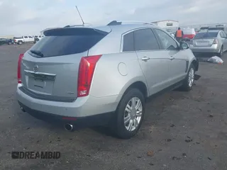 2015 Cadillac SRX Luxury Collection with VIN 3GYFNBE3XFS612048, listed as a IAAI auction lot 41923525 with 154,621 mi miles. Bid and sale history available at carsss.com. Image 4.