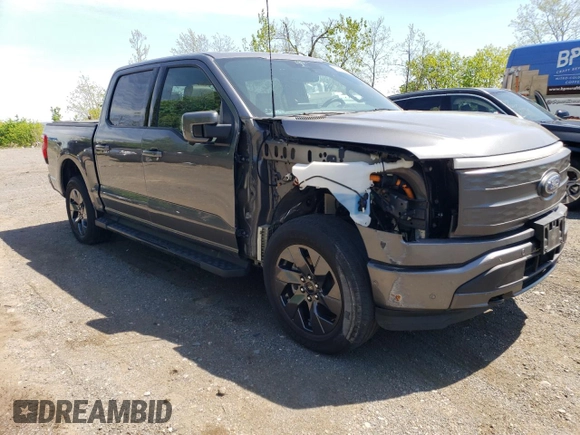 2022 Ford F-150 Lightning Pro z VIN 1FT6W1EV7NWG10033, wystawiony jako Copart lot #55569895 z przebiegiem 11 282 mil mil oraz Szkody całkowita. Historia ofert i sprzedaży dostępna na DreamBid. Obrazek 4.