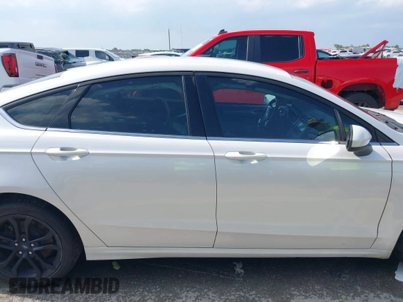 2020 Ford Fusion SE with VIN 3FA6P0HD3LR161093, listed as a IAAI auction lot 42127161 with 59,607 mi miles and . Bid and sale history available at DreamBid. Image 13.