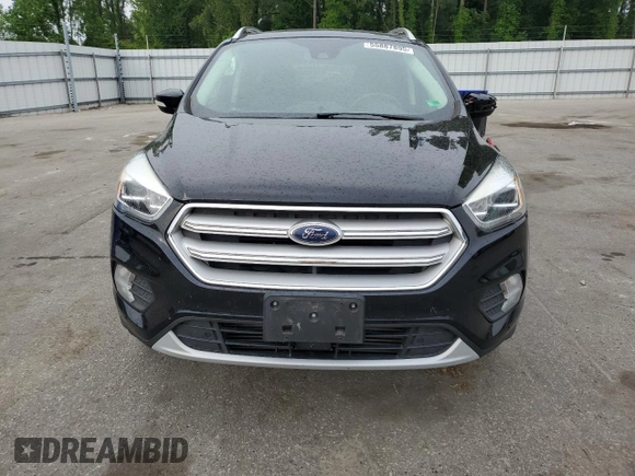 2019 Ford Escape Titanium with VIN 1FMCU0J95KUB14713, listed as a Copart auction lot 55887895 with 85,414 mi miles and Salvage title. Bid and sale history available at DreamBid. Image 5.