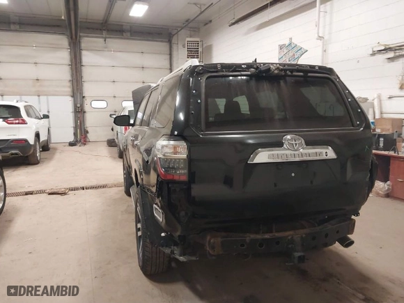 2014 Toyota 4Runner Limited with VIN JTEBU5JRXE5167219, listed as a IAAI auction lot 41835807 with 73,459 mi miles. Bid and sale history available at carsss.com. Image 6.