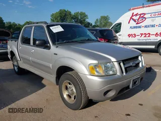2003 Ford Explorer Sport Trac XLS z VIN 1FMZU67EX3UB19974, wystawiony jako IAAI lot #42563671 z przebiegiem 133 452 mil mil oraz . Historia ofert i sprzedaży dostępna na DreamBid. Obrazek 1.