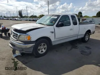 2000 Ford F-150 XL with VIN 1FTRX17W2YNB05575, listed as a Copart auction lot 86606934 with 0 mi miles and Salvage Title. Bid and sale history available at carsss.com. Image 1.
