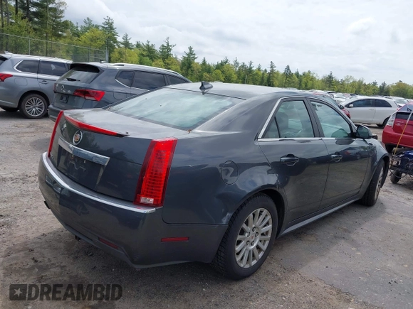 2012 Cadillac CTS z VIN 1G6DC5E54C0114309, wystawiony jako IAAI lot #42256621 z przebiegiem 148 698 mil mil oraz . Historia ofert i sprzedaży dostępna na DreamBid. Obrazek 4.