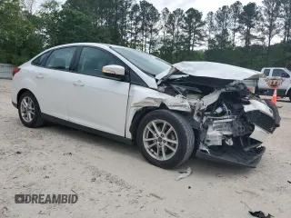 2016 Ford Focus SE with VIN 1FADP3F26GL369418, listed as a Copart auction lot 54256525 with 139,871 mi miles and Salvage title. Bid and sale history available at DreamBid. Image 4.