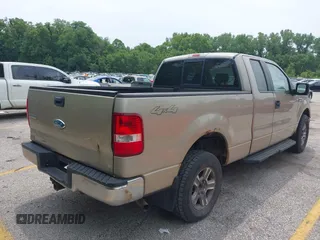 2007 Ford F-150 XLT z VIN 1FTPX14V97NA07290, wystawiony jako IAAI lot #42468839 z przebiegiem 160 463 mil mil oraz . Historia ofert i sprzedaży dostępna na DreamBid. Obrazek 4.