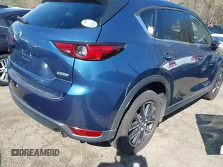 2017 Mazda CX-5 Grand Touring with VIN JM3KFADL8H0105518, listed as a IAAI auction lot 41876779 with 82,540 mi miles. Bid and sale history available at carsss.com. Image 4.