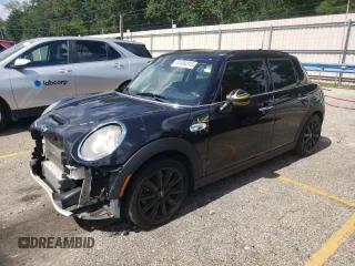 2016 MINI Hardtop 4 Door S with VIN WMWXU3C58G2B67264, listed as a Copart auction lot 61454215 with 66,550 mi miles and Salvage title. Bid and sale history available at DreamBid. Image 1.