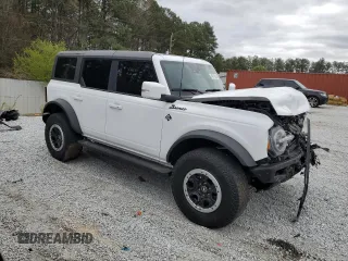 2023 Ford Bronco with VIN 1FMEE5DPXPLB37267, listed as a Copart auction lot 49710375 with 44,950 mi miles and Salvage Title. Bid and sale history available at DreamBid. Image 4.