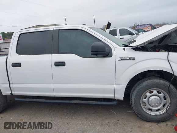 2019 Ford F-150 XL with VIN 1FTEW1C56KKF04321, listed as a IAAI auction lot 41597391 with 93,126 mi miles and . Bid and sale history available at DreamBid. Image 13.