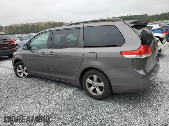2012 Toyota Sienna with VIN 5TDKA3DC8CS009526, listed as a Copart auction lot 80279714 with 186,703 mi miles and Salvage Title. Bid and sale history available at DreamBid. Image 2.