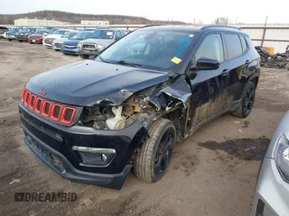 2020 Jeep Compass Latitude with VIN 3C4NJDBB9LT137387, listed as a IAAI auction lot 41379552 with 79,083 mi miles and . Bid and sale history available at carsss.com. Image 17.