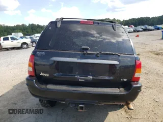 2004 Jeep Grand Cherokee Laredo z VIN 1J4GX48N64C362415, wystawiony jako Copart lot #68836614 z przebiegiem Nie podano mil oraz Szkoda całkowita • Salvage title. Historia ofert i sprzedaży dostępna na DreamBid. Obrazek 6.