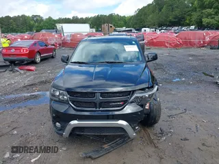 2015 Dodge Journey Crossroad with VIN 3C4PDCGBXFT543184, listed as a IAAI auction lot 42244021 with 200,000 mi miles and . Bid and sale history available at DreamBid. Image 13.
