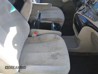 2013 Toyota Sienna LE AAS with VIN 5TDKK3DCXDS287357, listed as a IAAI auction lot 41172499 with 243,950 mi miles and . Bid and sale history available at DreamBid. Image 5.