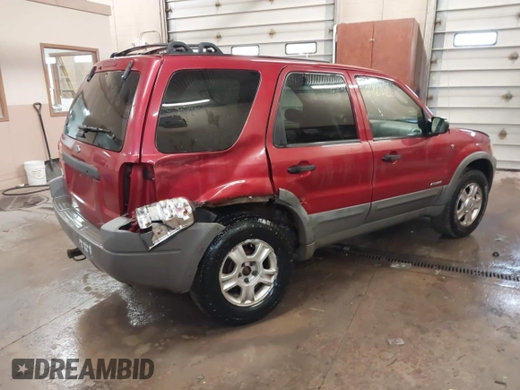 2001 Ford Escape XLT with VIN 1FMYU04101KF46809, listed as a IAAI auction lot 41664202 with 256,468 mi miles. Bid and sale history available at carsss.com. Image 4.